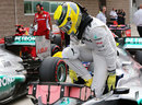 Nico Rosberg climbs out of his car after qualifying