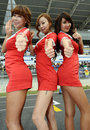 A grid girls prepare for the start of the race