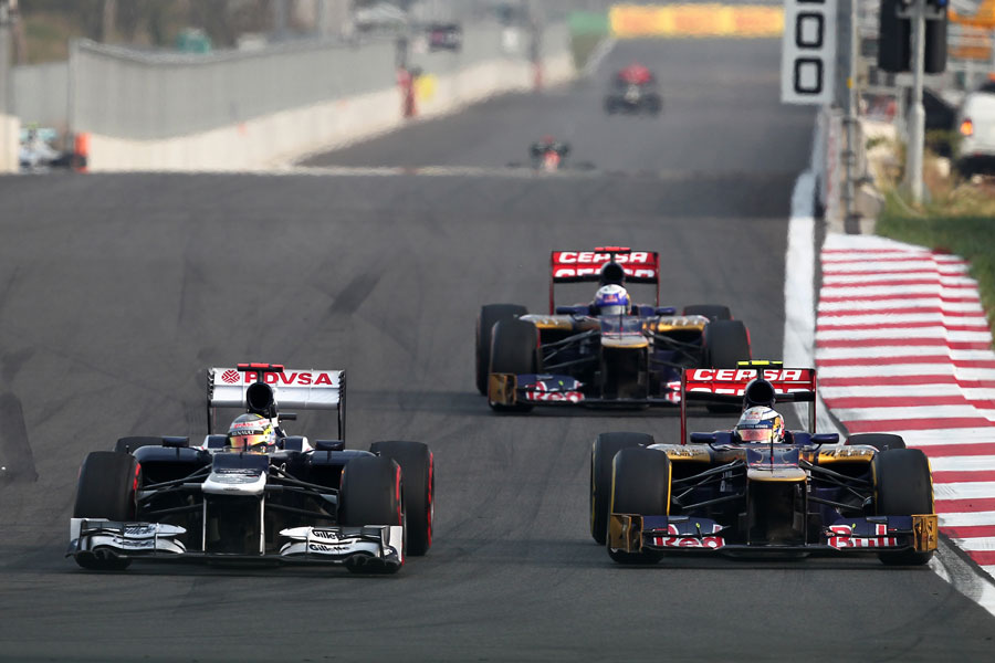 Jean-Eric Vergne and Daniel Ricciardo hound Pastor Maldonado's Williams