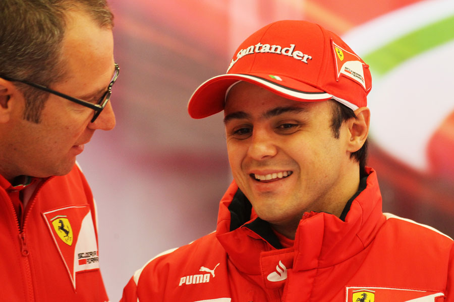 Felipe Massa and Stefano Domenicali joke in the Ferrari paddock