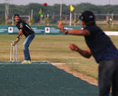 Mark Webber faces up to the bowling of Indian cricketer Gautam Gambhir