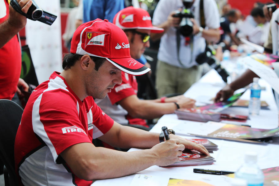 Felipe Massa signs autographs on Thursday afternoon