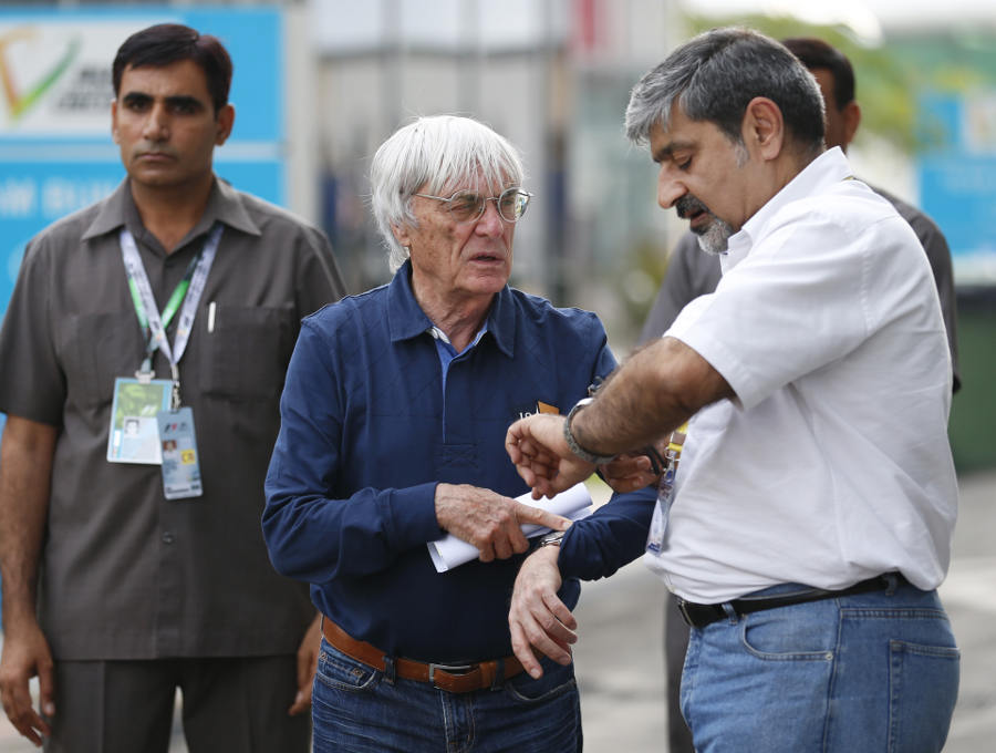 Bernie Ecclestone and Vicky Chandhok in the paddock on Thursday