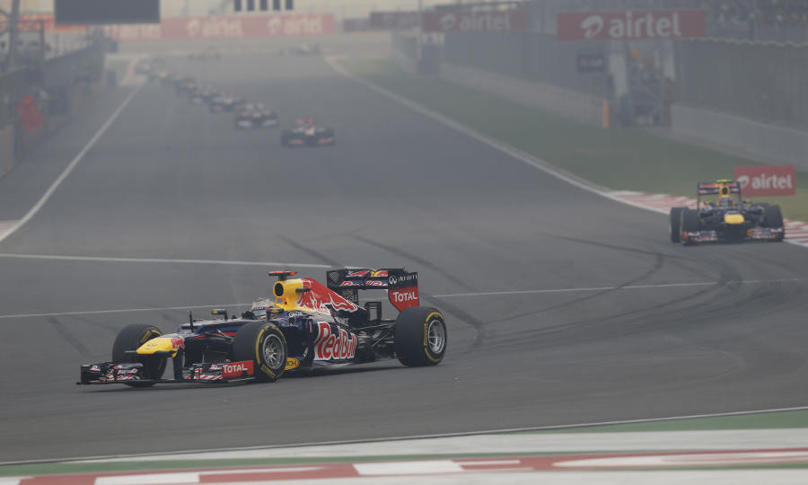 Sebastian Vettel leads Mark Webber and the rest of the field