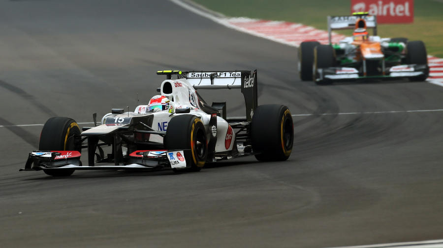 Sergio Perez leads Nico Hulkenberg in to turn one