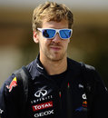 Sebastian Vettel arrives in the paddock on Thursday