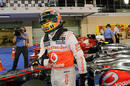 Lewis Hamilton celebrates taking pole position