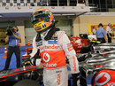 Lewis Hamilton steps out of his McLaren after taking pole position