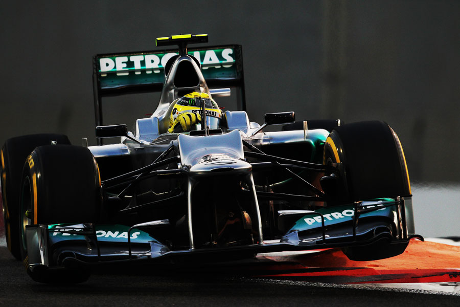 Nico Rosberg skips over the kerbs in his Mercedes
