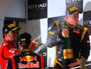 The rose water flows on the podium to celebrate Kimi Raikkonen's victory