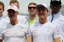 Michael Schumacher and Nico Rosberg pose for a photo 