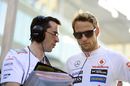 Jenson Button speak to his race engineer in Abu Dhabi