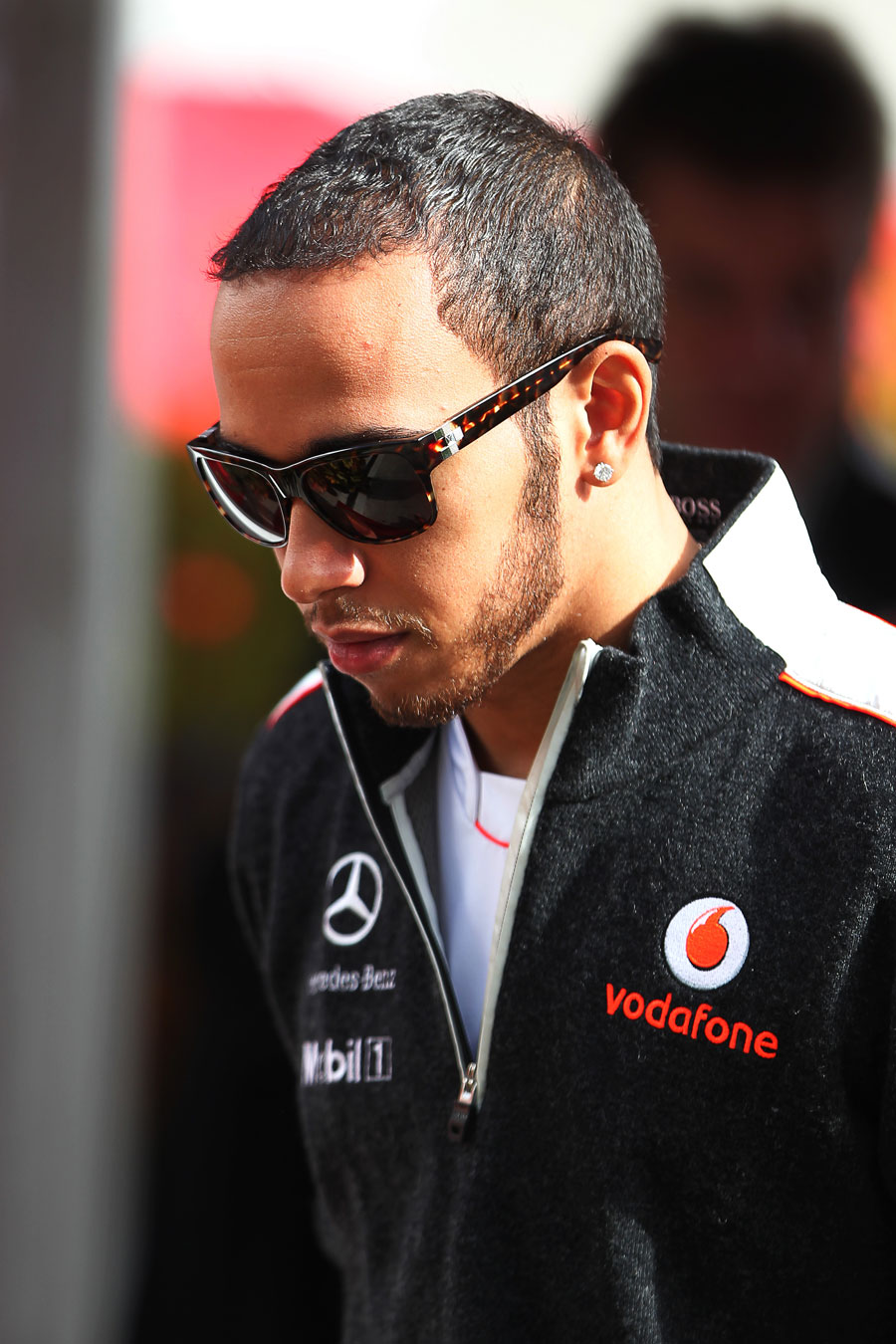 Lewis Hamilton arrives in the paddock on Thursday morning