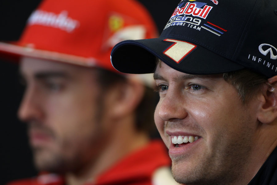 Sebastian Vettel speaks to the media during the driver press conference
