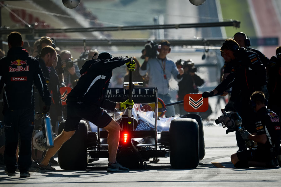 Mark Webber hits his marks for a practice pit stop