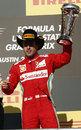 Fernando Alonso celebrates third place on the podium