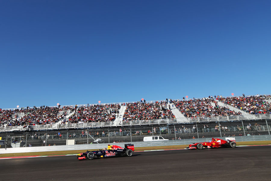 Sebastian Vettel leads Fernando Alonso on track