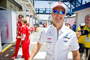 Michael Schumacher cuts a relaxed figure as he arrives for the final grand prix weekend of his career