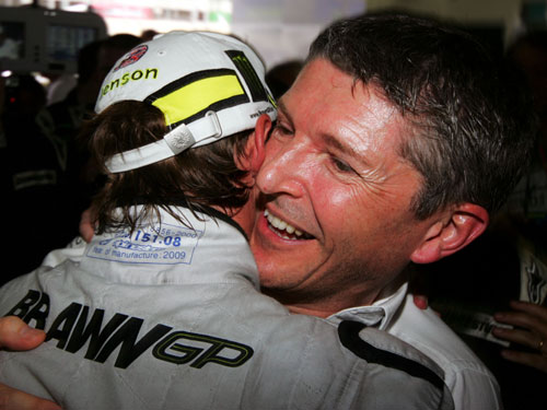Nick Fry celebrates Jenson Button's championship