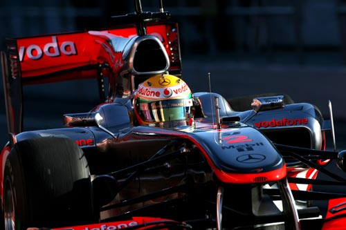 Lewis Hamilton takes to the track in the McLaren
