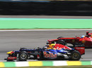 Sebastian Vettel passes Fernando Alonso on track
