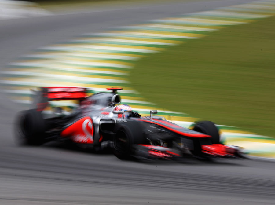 Jenson Button attacks the circuit in his McLaren