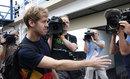 Sebastian Vettel arrives for the season finale