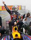 Sebastian Vettel celebrates his third world title