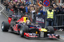 Sebastian Vettel displays his RB8 for fans in Graz