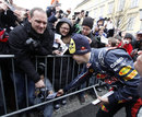 Sebastian Vettel signs autographs after a showrun in Graz