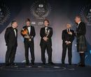 Sebastian Vettel and Christian Horner receive their awards at the FIA prize-giving gala alongside Jean Todt, Bernie Ecclestone and David Coulthard