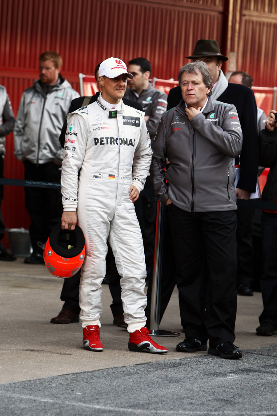 Michael Schumacher and Norbert Haug ahead of the launch of the W03