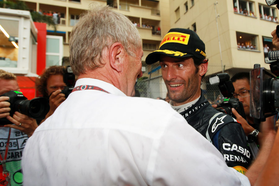 Mark Webber celebrates his victory with Helmut Marko