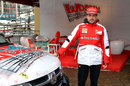 Fernando Alonso poses at Ferrari's Wrooom event