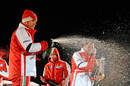 Fernando Alonso celebrates his victory in the Ferrari ice race