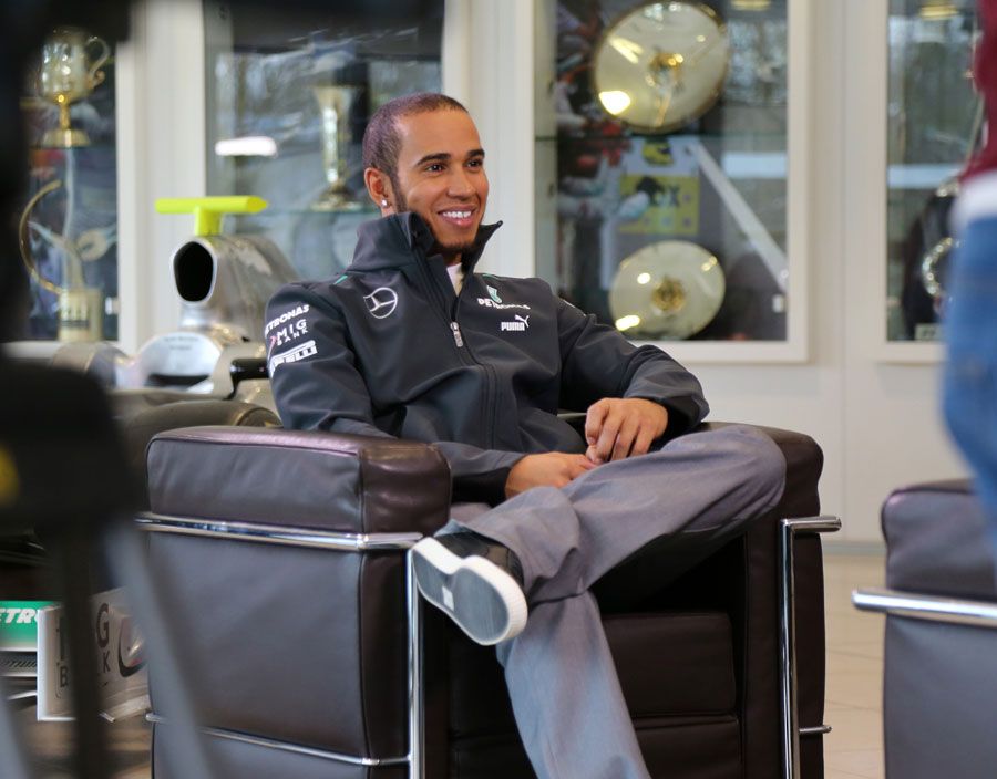 Lewis Hamilton conducts an interview at the Mercedes factory