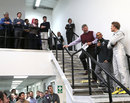 Lewis Hamilton, Ross Brawn and Nico Rosberg address the workforce at the Mercedes factory