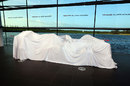 The new McLaren MP4-28 under wraps ahead of its launch