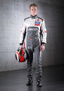 Nico Hulkenberg poses for a photo in his new Sauber overalls