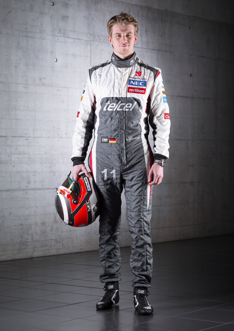 Nico Hulkenberg poses for a photo in his new Sauber overalls