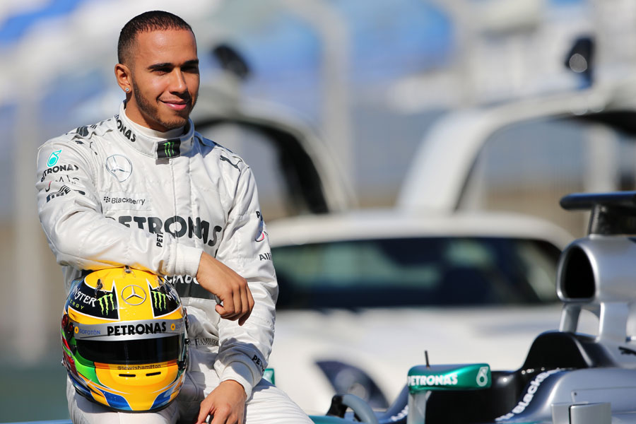 Lewis Hamilton poses with the new Mercedes W04