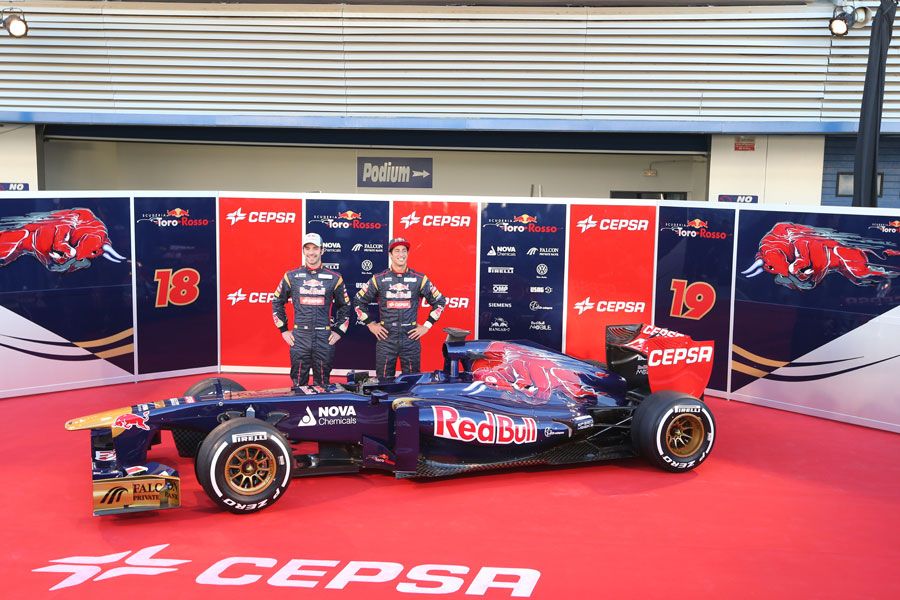 Jean-Eric Vergne and Daniel Ricciardo with the new Toro Rosso STR8 in the Jerez pit lane