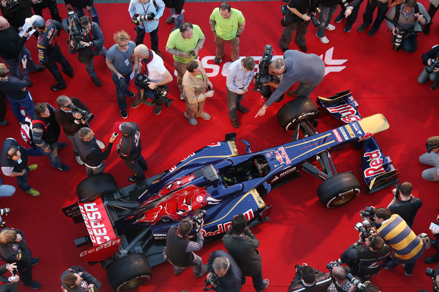Media and photographers surround the new Toro Rosso STR8
