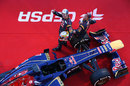Jean-Eric Vergne and Daniel Ricciardo wave to photographers during the launch of the Toro Rosso STR8