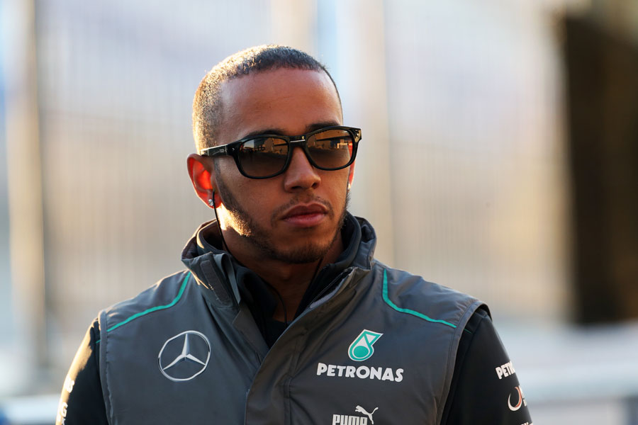 Lewis Hamilton arrives at the circuit on Tuesday morning