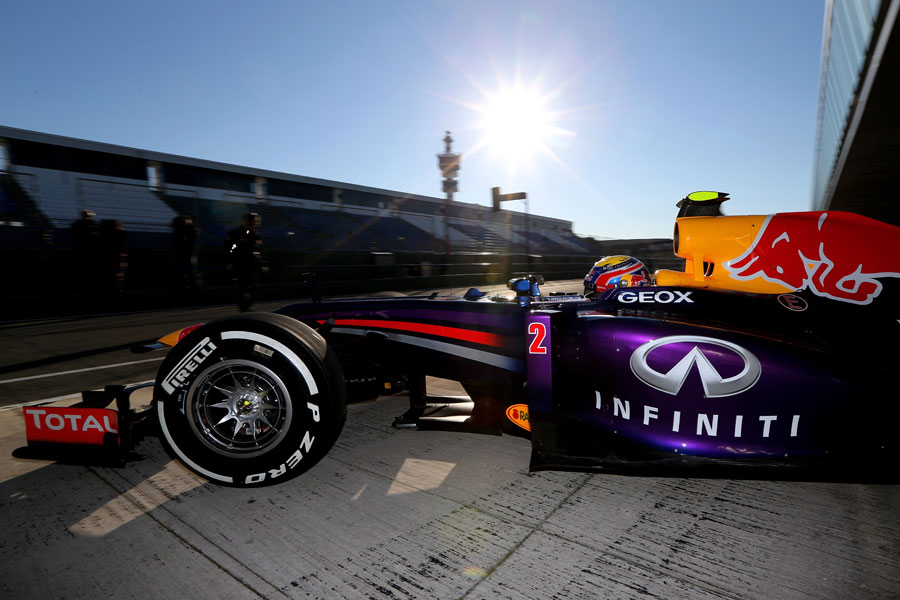 Mark Webber heads out in to the sunshine in the RB9