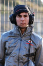 Sergio Perez watches on from the McLaren pit wall