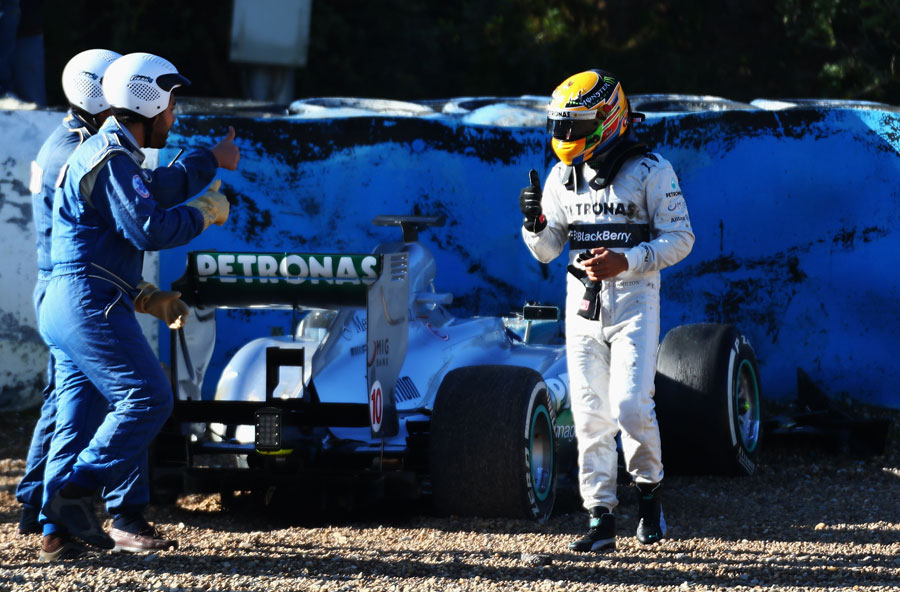 Lewis Hamilton gives the thumbs up after crashing at turn six
