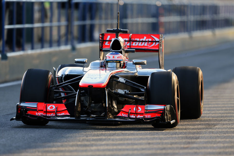 Jenson Button rolls down the pit lane ahead of another run