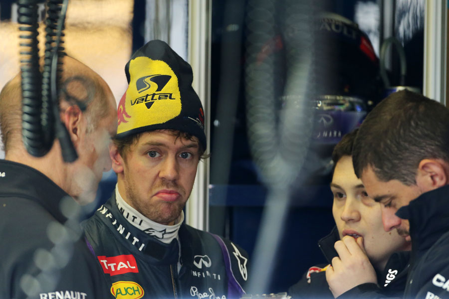 Sebastian Vettel talks with Adrian Newey and his engineers